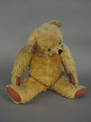 A large yellow Merrythought bear with articulated limbs 23"