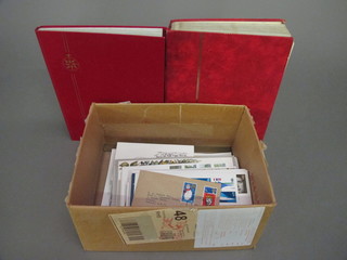 2 stock books of stamps and a collection of first day covers