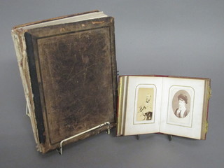 A Victorian red leather photograph album and 1 other