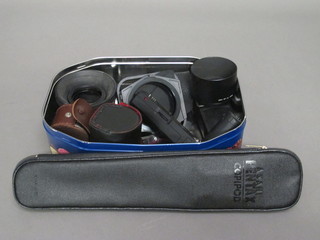 A quantity of flash units, a light meter and other camera accessories