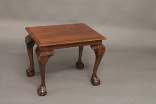 A rectangular mahogany occasional table raised on cabriole ball  and claw supports 24"