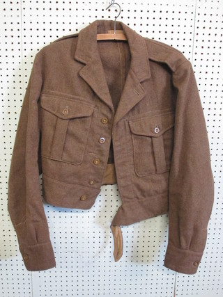 A 1949 size 11 battle dress blouse, some moth,