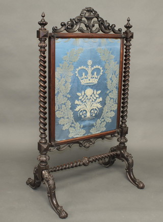 A Victorian rosewood fire screen with embroidered panel depicting a Queens crown and various emblems of England 31"   ILLUSTRATED