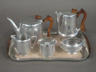 A 6 piece Picquot tea service with rectangular tray, teapot,  hotwater jug, cream jug and 2 sugar bowls
