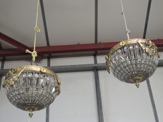 A pair of circular gilt metal and cut glass light fittings 12"