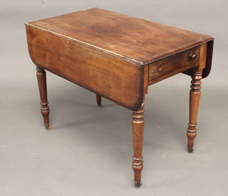 A 19th Century mahogany Pembroke table fitted a drawer, raised  on turned supports 36"