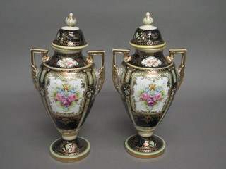 A handsome pair of Noritake twin handled urns and covers with floral decoration 15"  ILLUSTRATED