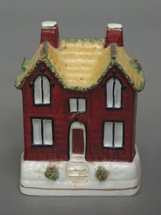 A 19th Century Staffordshire money box in the form of a red brick house 5"  ILLUSTRATED