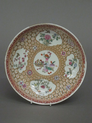An Oriental bowl with panel decoration, the base with 6 character mark 8"  ILLUSTRATED