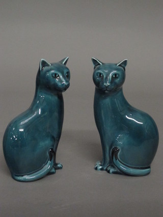 A pair of Poole Pottery blue glazed figures of seated cats 6 1/2"