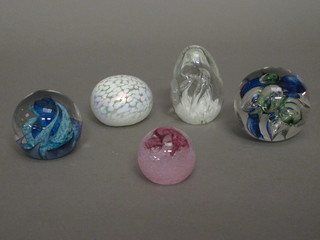 A Caithness Pixie paperweight, a Langham paperweight, a  Selkirk paperweight and Indigo 99