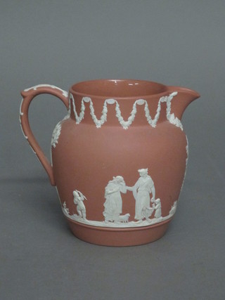 A terracotta Wedgwood Jasperware jug decorated figures, base impressed  58W, 5"