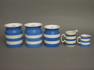 A T G Green & Co blue and white striped kitchen storage jar marked Currants, the base with green cathedral mark 6",  together with 2 Cornish Kitchenware blue and white striped  kitchen jars, the bases with shield mark 7", 1 f and r, and 2  matching jugs 4" and 3"