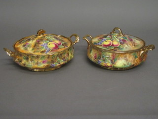 A pair of Baroness China Worcester style twin handled tureens  and covers decorated fruit 8"