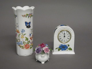 A battery operated clock contained in an Aynsley Chelsea flower  pattern arch shaped case, an Aynsley cottage garden patterned  cylindrical vase 8" and a small posy