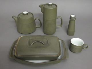 A 62 piece green glazed Denby dinner/tea service comprising  rectangular dish 16", tureen and cover 11", 10 cups and 10  saucers, oval dish 10", 8 egg cups, 6 bowls 5", teapot, coffee  pot, 3 piece condiment set, 2 oil and vinegar jars, sauce boat and  stand, saucepan, circular dish 3 1/2", 6 bowls 6", 3 dinner plates  10", 6 side plates 8"