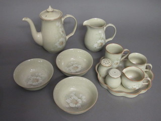 A Denby 66 piece Day Break pattern dinner service comprising 8 oval plates 13", 6 dinner plates 10", 7 side plates 8" - 1 chipped,  8 tea plates 7", 8 pudding bowls 6 1/2", teapot, coffee pot, sugar  bowl and large milk jug 6", cream jug 4", 2 piece condiment set,  jug 2", 7 saucers, 2 mugs, 9 cups, 2 circular bowls 3" and a  circular dish 10"