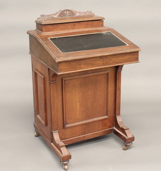 An Edwardian walnut Davenport the top with stationery box with hinged lid, the pedestal fitted 3 drawers 22"