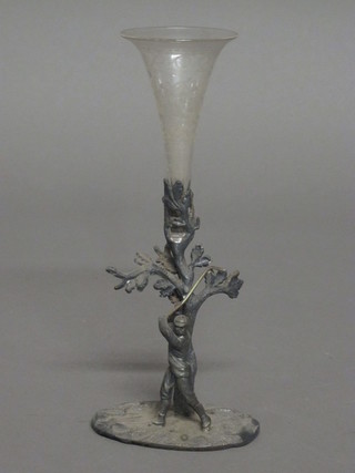 A Britannia metal epergne in the form of a golfer by a tree with etched glass vase