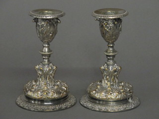 A pair of Rococo style squat silver plated candlesticks with detachable sconces, drilled for lamps, 5"