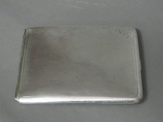 A silver cigarette case, Birmingham 1931 with engine turned decoration, 3 1/2 ozs