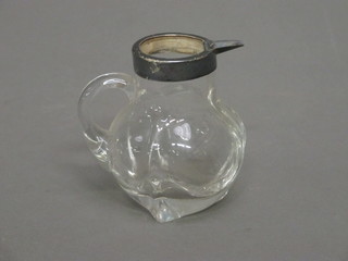 A Victorian glass and silver mounted jug London 1899, 3"