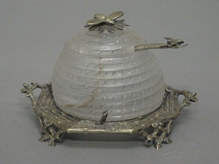 A handsome Victorian silver plated and cut glass honey pot in the form of a beehive with bee finial,