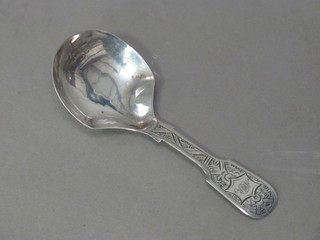A Victorian silver fiddle pattern caddy spoon, Birmingham 1869 by George Unite  ILLUSTRATED