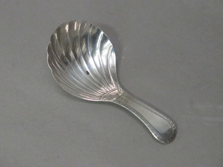 A George IV silver caddy spoon with scallop shaped bowl,  London 1825 by William Trayes  ILLUSTRATED