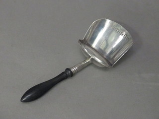 A George IV silver caddy spoon with turned ebony handle,  Birmingham 1820 by Joseph Willmore