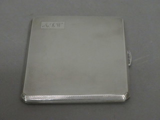 A silver cigarette case with engine turned decoration Birmingham 1936, 3 1/2 ozs