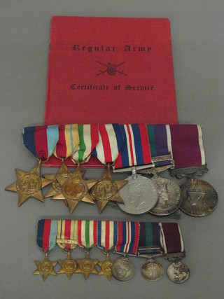 A group of 7 medals to 652727 Sgt. Later Corporal Warrant Officer 2nd Class E E Burgess Royal Armoured Corps and Tank  Regt. comprising 1939-45 Star, Africa Star, Italy Star, France &  German Star, British War medal, General Service medal  1918-1962 Elizabeth II issue 1 bar Malaya, George VI issue  Army Long Service Good Conduct medal together with a group  of miniature medals and pay book