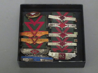 4 National Safe Driving ribbons together with a badge