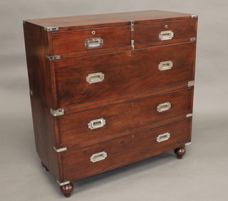 A 19th Century camphor and chrome banded military chest in 2 sections, the upper section fitted 2 short drawers above 1 long  drawer, the base fitted 2 long drawers, raised on bun feet 39"   ILLUSTRATED