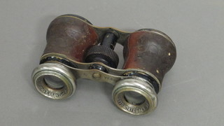 A pair of French opera glasses marked Le Sporting Club