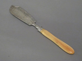A Victorian silver butter knife with engraved blade