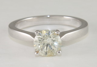 An 18ct white gold solitaire diamond set dress ring with certificate