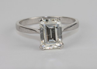 An 18ct white gold emerald cut dress/engagement ring set a  solitaire diamond, approximately 2.07ct, complete with EDR  jewellery report