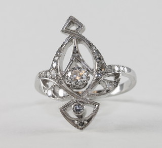 A pierced white gold Art Nouveau style dress ring set diamonds