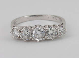 A lady's 18ct white gold dress/engagement ring set 5 brilliant cut diamonds, approx 1.35ct