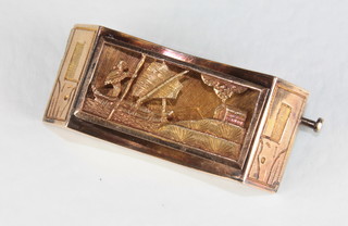 An Eastern rectangular gilt metal brooch