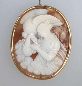 An oval shell carved cameo brooch contained in a gilt metal  mount, f,