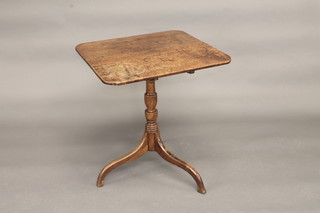 A 19th Century elm rectangular snap top wine table, raised on pillar and tripod base 24"