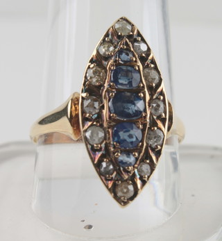 A lady's 18ct marquise shaped dress ring set sapphires and  diamonds