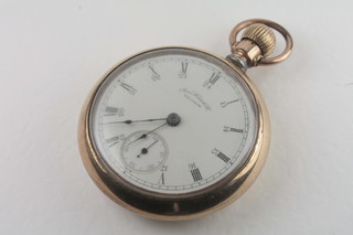 A Waltham open faced pocket watch contained in a gold plated  case