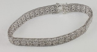 An Edwardian style 18ct white gold bracelet set numerous  diamonds, approx 7.35ct  ILLUSTRATED