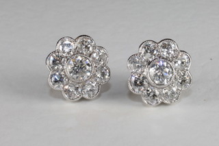 A pair of diamond set cluster earrings, approx 2.60ct