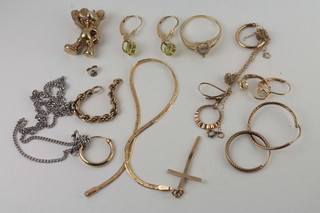 A gilt cross, various gilt earrings and chains