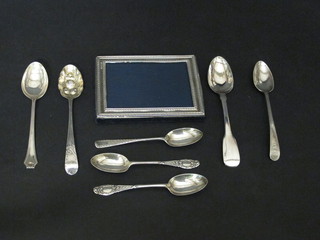 A modern silver easel photograph frame 4" x 3" and 7 various teaspoons, 2 ozs