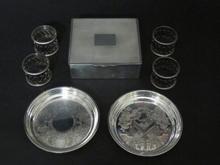 2 circular silver plated ashtrays by Mappin & Webb 4", do.  cigarette box with hinged lid 4 1/2" and 4 silver plated napkin  rings